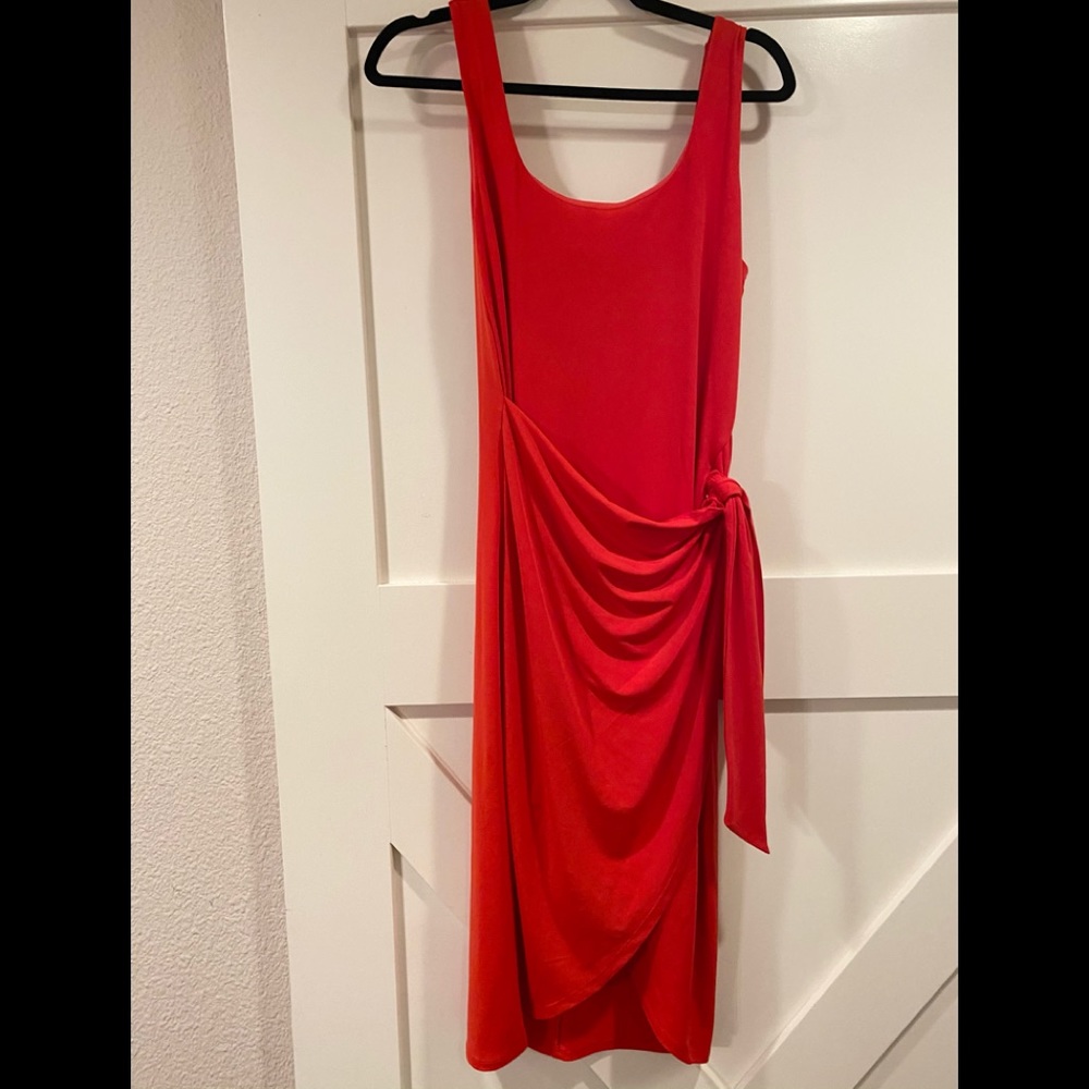 Express sleeveless dress. Pull on style with wrap front detail.
